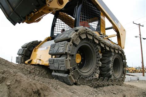 tracks vs tires on skid steer|track vs wheeled skid steer.